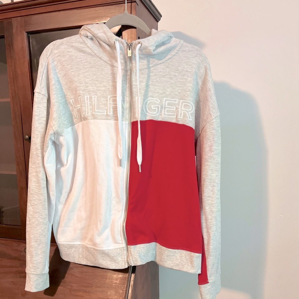 Brand new Tommy Hilfiger zip up jacket with hood